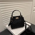 Chic leopard print handbag in dark black suede finish with elegant golden hardware - Black