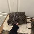Classic brown crossbody bag with M-pattern jacquard and silver chain strap details - Brown