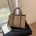 Retro patchwork tote bag in brown leather and weave on black chair in natural light - Coffee (No Pendant)