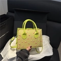Lime green cherry print small square handbag with double handles and shoulder strap - Green