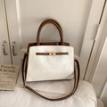 Retro white and brown two-tone top-handle handbag with metallic twist lock closure - White Without Pendant