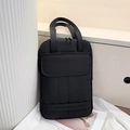 Chic black vertical quilted tote bag with front pocket and dual handles for tablet - Black