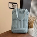Light blue quilted tote bag with front pocket and double handles for laptop storage - Blue