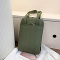 Army green quilted rectangle tote bag in puffy nylon fabric with durable top handles - Green