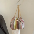Colorful striped straw bucket bag with gold chain strap and pearl drawstring tassels - Brown