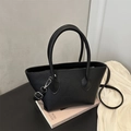 Minimalist black lychee texture leather handbag with silver hardware and shoulder strap - Black