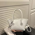 White lychee grain leather handbag with adjustable crossbody strap and silver hardware - White