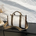 Minimalist beige canvas tote bag with brown straps and large storage capacity - Brown