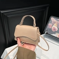 Beige mini crossbody bag with silver hardware and sleek handle for trendy women - Khaki