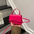 Mini handbag in fluorescent pink with wavy flap detail and top handle for women - Rose Red