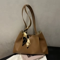 Caramel brown leather tote bag with decorative silk scarf and large capacity for commuting - Tan