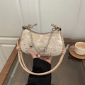 Beige chic shoulder bag with abstract print fabric, metal chain and pearl heart pendant - Khaki