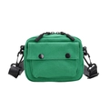 Kids minimalist solid green canvas shoulder bag with black strap and flap pocket - Green