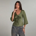 Elegant deep olive green satin shirt with V-neck tie and flared sleeves on model - XL / Army Green