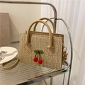 Woven cherry crossbody bag in beige straw with brown leather handles and strap - Khaki
