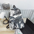 Graffiti style backpack in black and white featuring Unruly print and laptop sleeve - Black