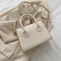 Bolso de mano minimalista blanco crema con asas y correa de hombro ajustable de piel - Blanco