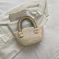 Handmade cream straw bucket bag with rainbow woven handle and fringe details - Colorful