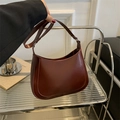Detail view of smooth dark brown vintage crescent moon faux leather underarm bag - Dark Brown