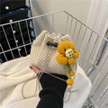 Beige woven bucket bag with large yellow flower charm and silver metal chain strap - Floral Pattern Cream White