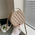 Detail of beige quilted PU leather crossbody bag with dual golden zippers and handle - Khaki
