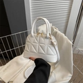 White geometric quilted crossbody bag with golden hardware and top handle for women - White