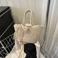Minimalist beige woven tote bag with lace bow and wave texture for summer fashion - Off White