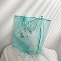 Mint green mesh tote bag with minimalist logo patch for casual shopping and daily use - Blue