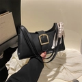 Fashionable black quilted PU shoulder bag with a gold buckle and printed silk scarf - Black