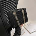 Fashionable black wave quilted faux leather crossbody bag with elegant gold chain strap - Black