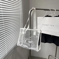 Transparent PVC tote bag with white fabric straps and topographic pattern finish - White