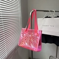 Modern pink translucent PVC tote bag with marble texture and woven handles - Pink