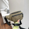Detailed macro view of olive green corduroy waist bag showing soft texture and dual zippers - Olive Green