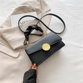 Chic black ruched handle crossbody bag with a textured gold round buckle detail - Black