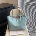 Light blue nylon tote bag with metal nameplate and long shoulder straps for daily use - Green