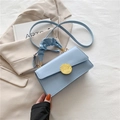 Light blue ruched handbag with golden hammered buckle and detachable shoulder strap - Blue