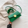 Green pleated handbag in PU leather with gold buckle and adjustable shoulder strap - Green