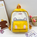 Cute yellow and white cartoon cat backpack for kids with fashion instinct woven label - Yellow
