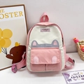 Pink and white cat-themed children's backpack featuring decorative ears and flap pocket - Pink
