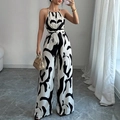 Women's halter jumpsuit with black and white abstract print and wide-leg silhouette - S / Black and White