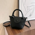 Bolso cubo vintage de cuero PU negro con patrón de lichi y detalles metálicos oro - Negro