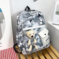 Women's floral camo backpack featuring a plush bear charm and multiple pockets - Light Gray