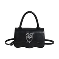 Schicke schwarze Lederhandtasche mit silberner Herzschnalle und Wellenklappe - Schwarz