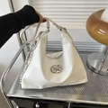 White faux leather hobo bag with silver metal ring logo and chain strap detail - White