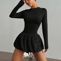 Elegante vestido negro de manga larga con corpiño ajustado y falda globo de punto elástico - S / Negro