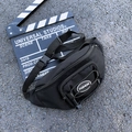 Sleek black nylon waist bag with FASHION logo and adjustable crossbody strap - Black