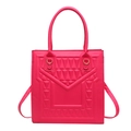 Vibrant magenta crossbody bag with geometric embossed pattern and gold hardware - Rose Pink