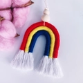 Macro detail of hand-woven rainbow hanging decor with cotton ropes and wooden beads - Red Yellow Blue Color (C12)