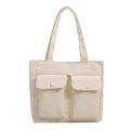 Minimalistische beige Canvas-Einkaufstasche mit Utility-Taschen und stabilen Griffen - Weiß
