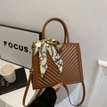 Brown quilted tote bag with silk scarf accent and adjustable crossbody strap for women - Brown